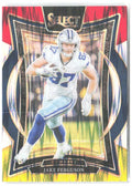 Jake Ferguson Panini Select - Red & Yellow Prizm Shock 64 2024 Dallas Cowboys